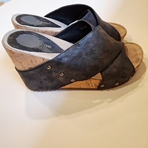 Antelope Charcoal Gray Cork Wedge Slide Sandals with Stud Accents.